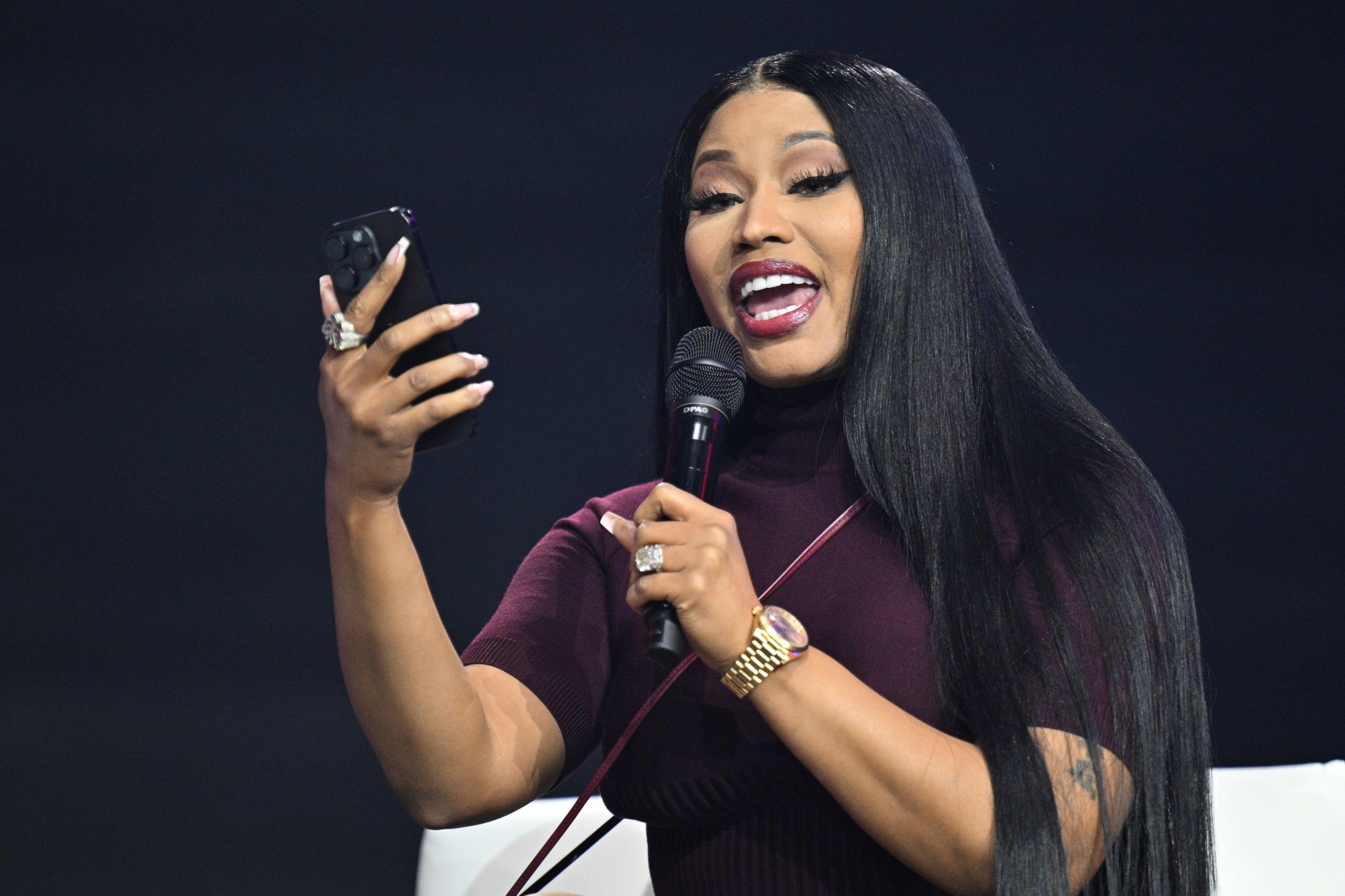 Nicki Minaj speaks during Turning Point USA's AmericaFest 2025, Sunday, Dec. 21, 2025, in Phoenix. (AP Photo/Jon Cherry)