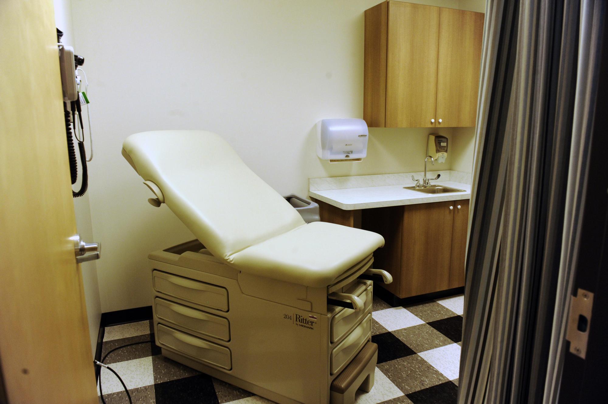 FILE – An exam room at a medical clinic in Detroit on July 29, 2015. (Charles V. Tines/Detroit News via AP, File)

